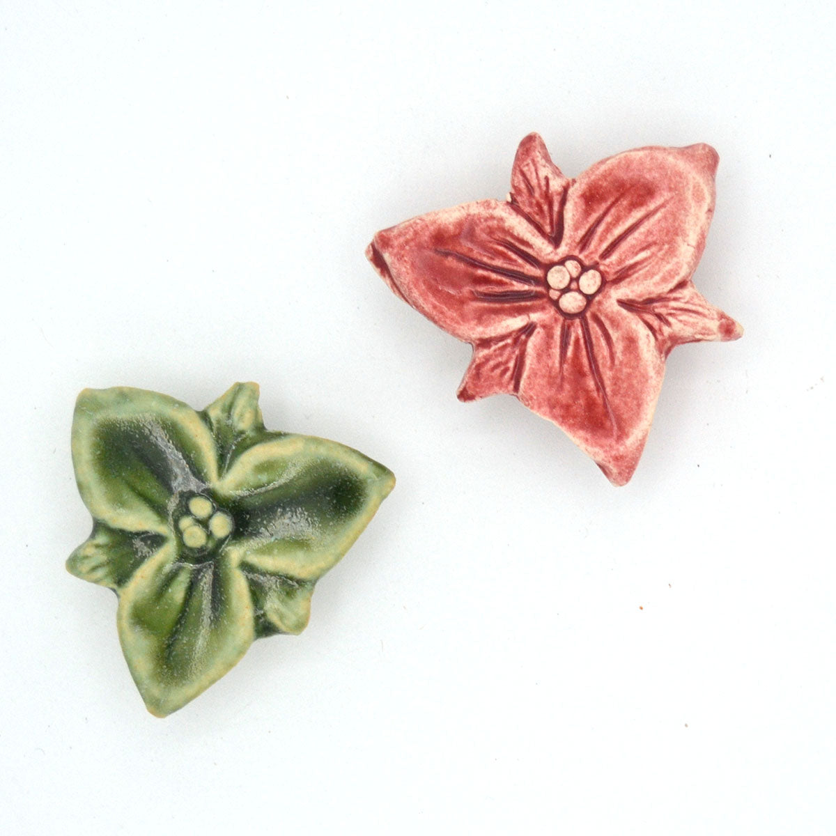 small trillium magnets in light pink or green