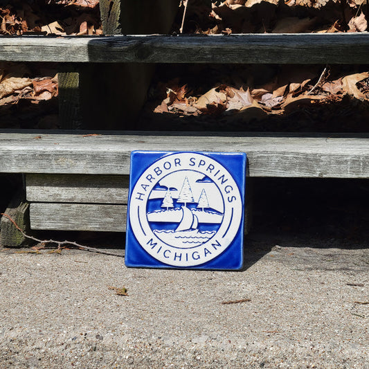 hs logo tile at base of boardwalk