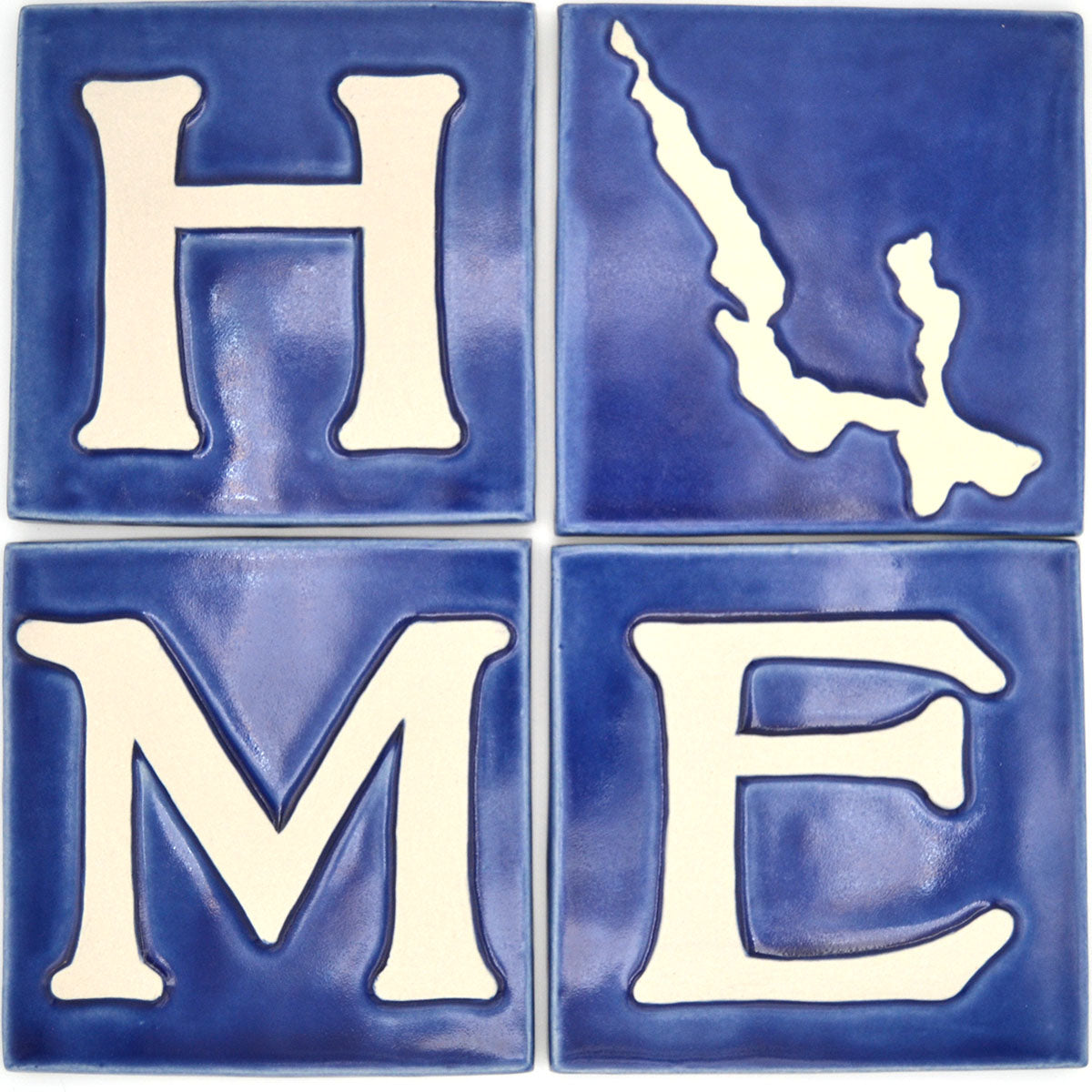 four tile set spelling home with walloon