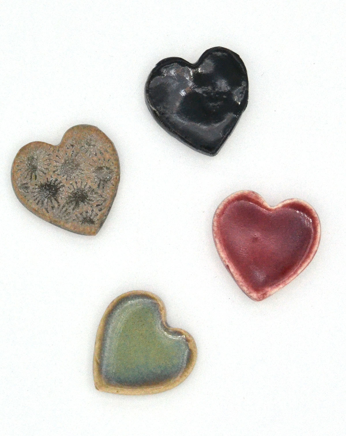 one inch ceramic hearts in varying colors