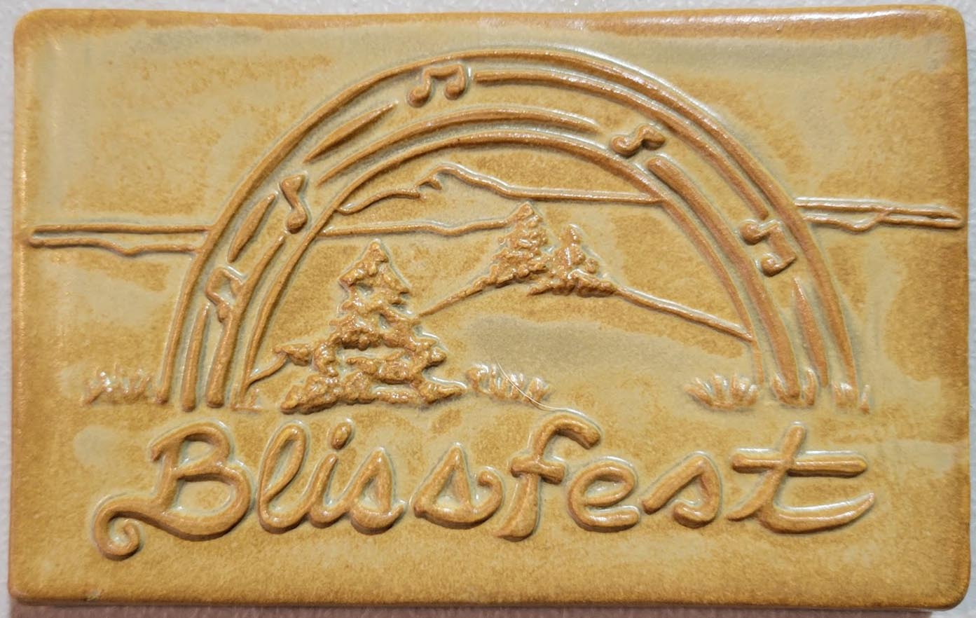 blissfest logo tile yellow